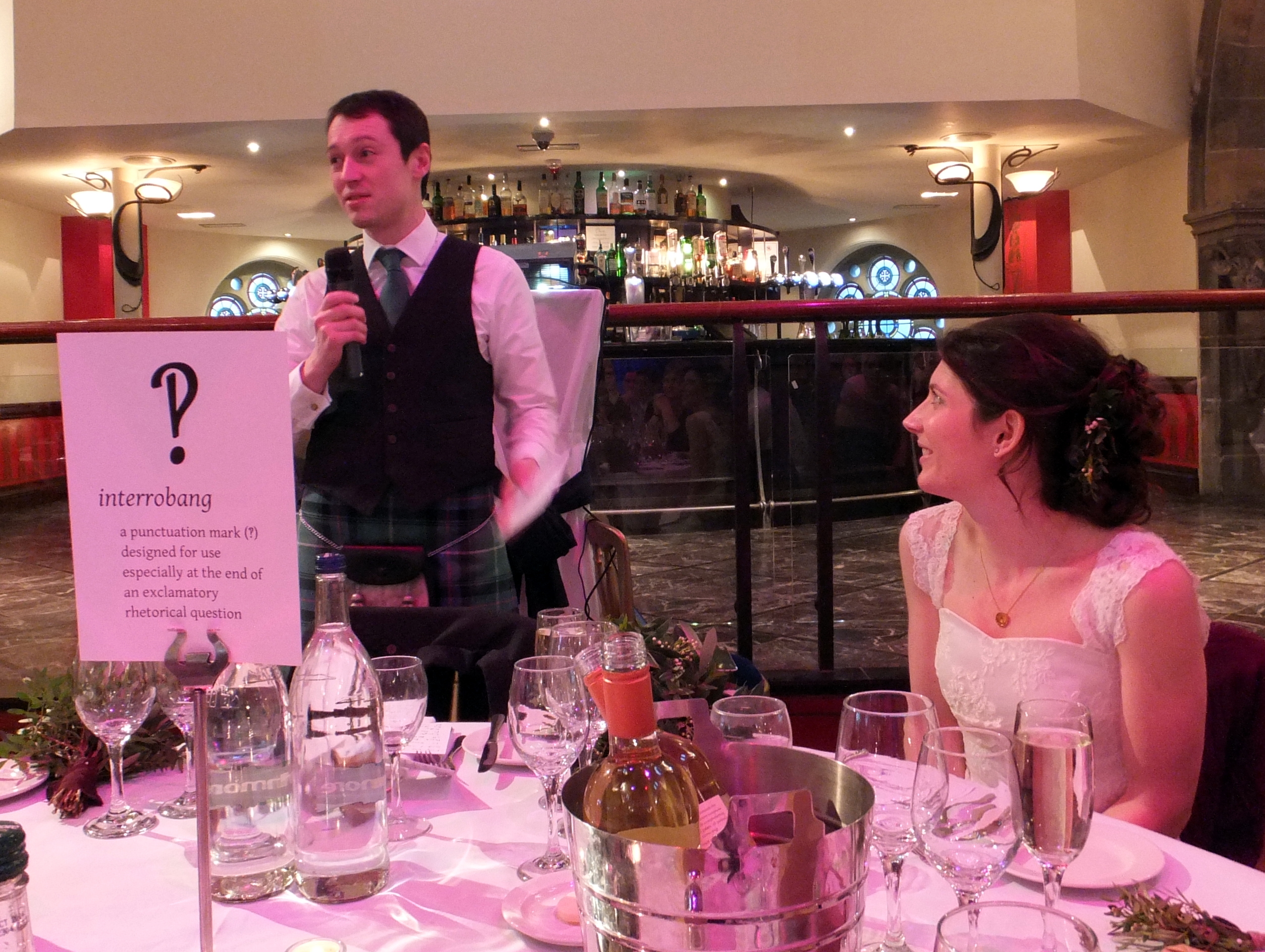 Captured in the middle of a middling speech. The text on the card is in the open source typeface Gentium, which doesn't have a native interrobang, so I cobbled one together from its exclamation and question marks. (Photography by Elizabeth Houston.)